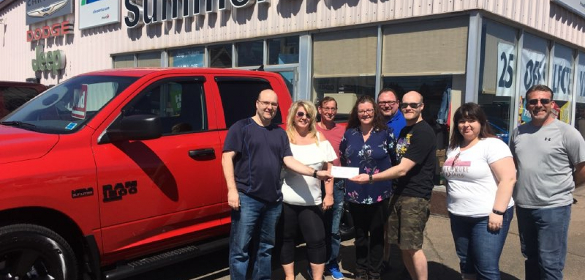 Executive of PEI Darts Association Accepting cheque from Summerside Chrysler Dodge